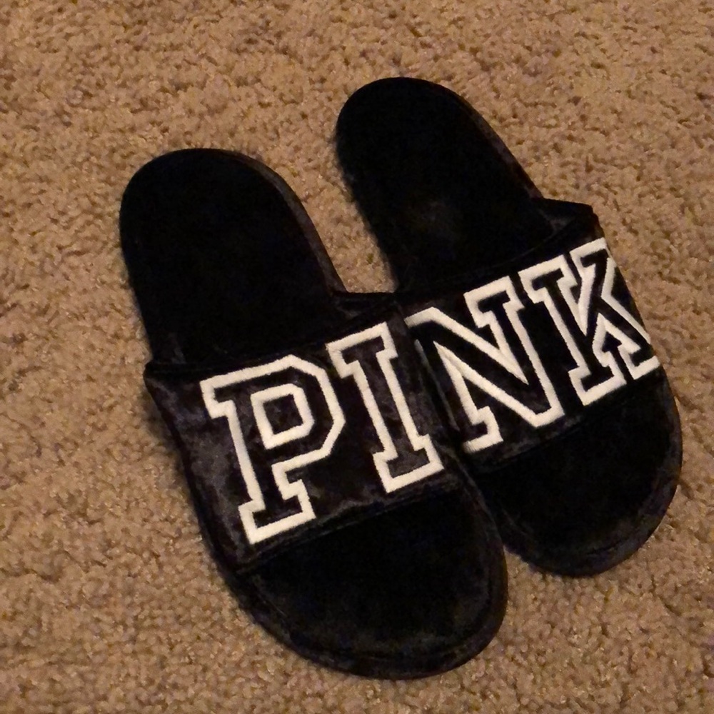 Black pink brand slippers.